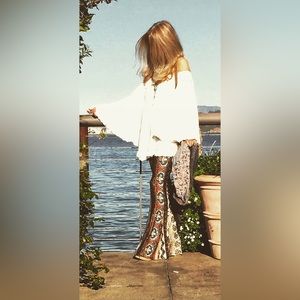 By FREE PEOPLE . It’s TTS . Worn a few times.